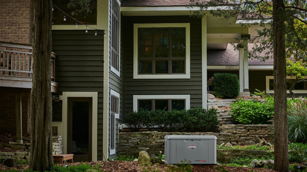 A Briggs & Stratton Generator for a Hurricane Installed in a Backyard